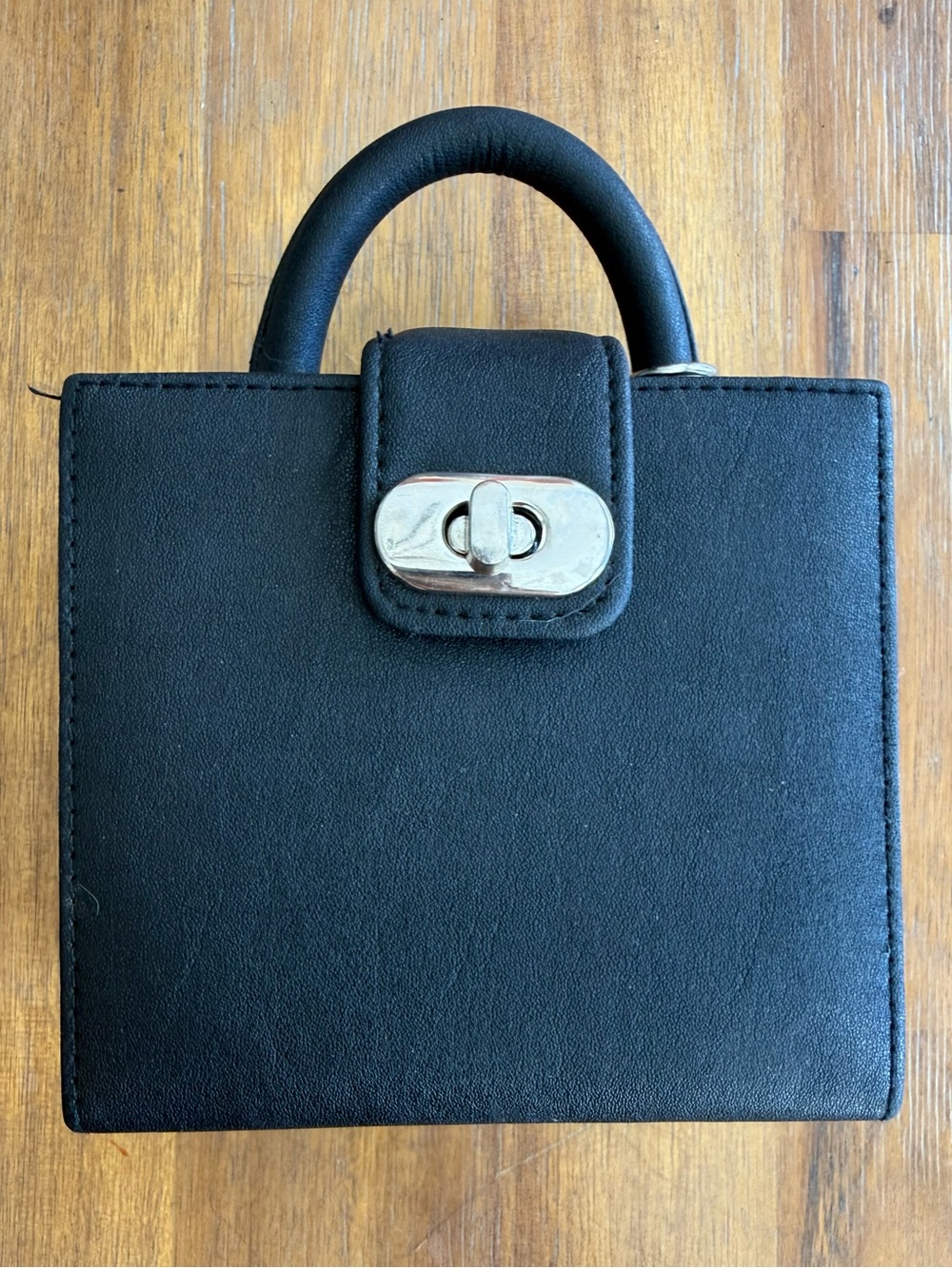 Black Top-Handle Women's Handbag with Turn-Lock Closure
